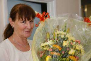 Prism’s Brenda Butcher was presented with flowers, a cake and her long service watch to mark her 25 years service with the company.