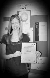 The NVQ in Business Improvement Techniques provides Prism staff with the necessary skills to improve business performance to benefit customers –- Lindsay Webb with her certificate.