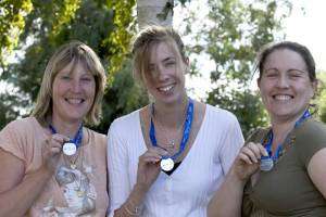 Pictured with their race medals are Lindsay Webb (centre) flanked by Nicola Shepherd (left) and Kellie Whitworth (right).